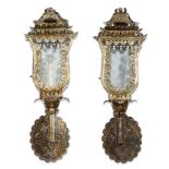A pair of gilt and hammered white metal carriage lanterns 19th century H: 26 in. PROVENANCE: