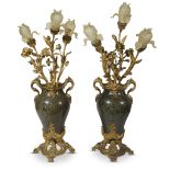 A pair of Louis XV style gilt-bronze mounted verde ranocchia marble and three-light lamps circa