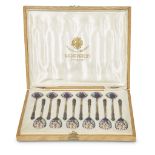 A set of twelve Russian silver-gilt and shaded cloisonné enamel spoons in original box Maria