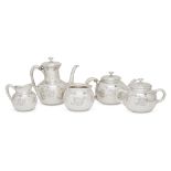 An American sterling silver hand-hammered five-piece tea and coffee service Whiting Mfg. Co.,