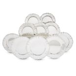 Twelve American sterling silver service dishes Tiffany & Co., New York, 1907-1947 Shaped with molded