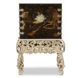 A Charles II lacquer cabinet on silver-gilt carved stand the cabinet and stand both 17th century The