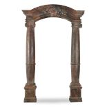 A French Baroque style faux-marbre architectural door surround 19th century The arched pediment