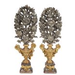 A pair of large Italian silvered and giltwood twelve-light garnitures early 20th century Each in the