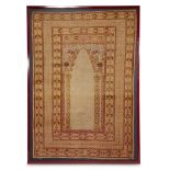 A Panderma prayer rug Anatolia, circa late 19th/early 20th century Framed and on backing. 6 ft. 1