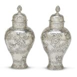 A pair of George III sterling silver repoussé ginger jars Samuel Hennell, London, 1811 Each marked