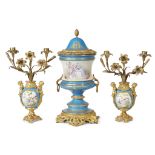 An assembled Sèvres style gilt-bronze mounted bleu céleste porcelain vase garniture set late 19th