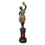 A large Venetian polychromed figural torchère on pedestal late 19th century H: 68 in. PROVENANCE: