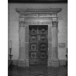 A palatial Italian Renaissance carved marble and walnut doorway 16th century Of impressive post