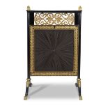 A large Continental Neoclassical ebonized and parcel-gilt firescreen first quarter 19th century H: