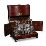 A Napoleon III brass-inlaid amboyna and etched glass tantalus set third quarter 19th century The
