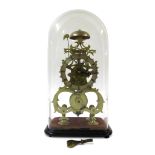 A Victorian brass skeleton clock 19th century The chapter ring with enameled Roman numerals, the