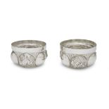 A pair of Continental silver Renaissance Revival lobed bowls likely German, bearing spurious
