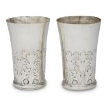 A pair of Polish silver beakers maker's mark DW, Breslau, first quarter 18th century Each chased