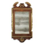 A George I parcel-gilt walnut mirror first quarter 18th century In original condition and with