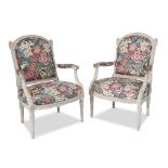 A pair of Louis XVI white painted fauteuils 18th/19th century H: 39 1/2, W: 27 1/2, D: 20 in.