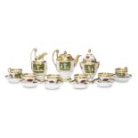 A Restauration Paris porcelain parcel-gilt and hand painted tea service second quarter 19th