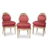 Three Italian Neoclassical style white-painted and parcel-gilt side chairs 20th century With crimson