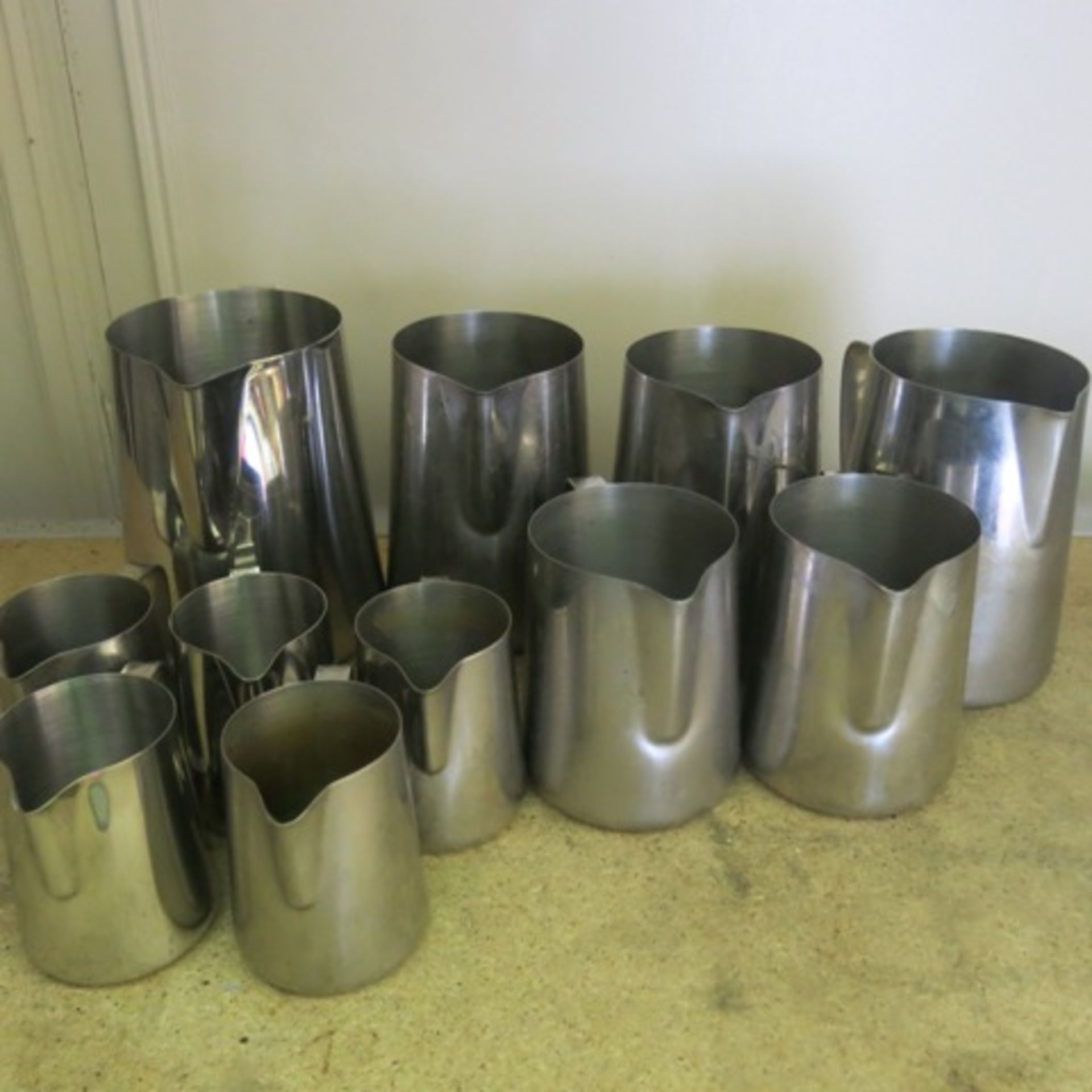 13 x Assorted Sized Stainless Steel Milk Jugs