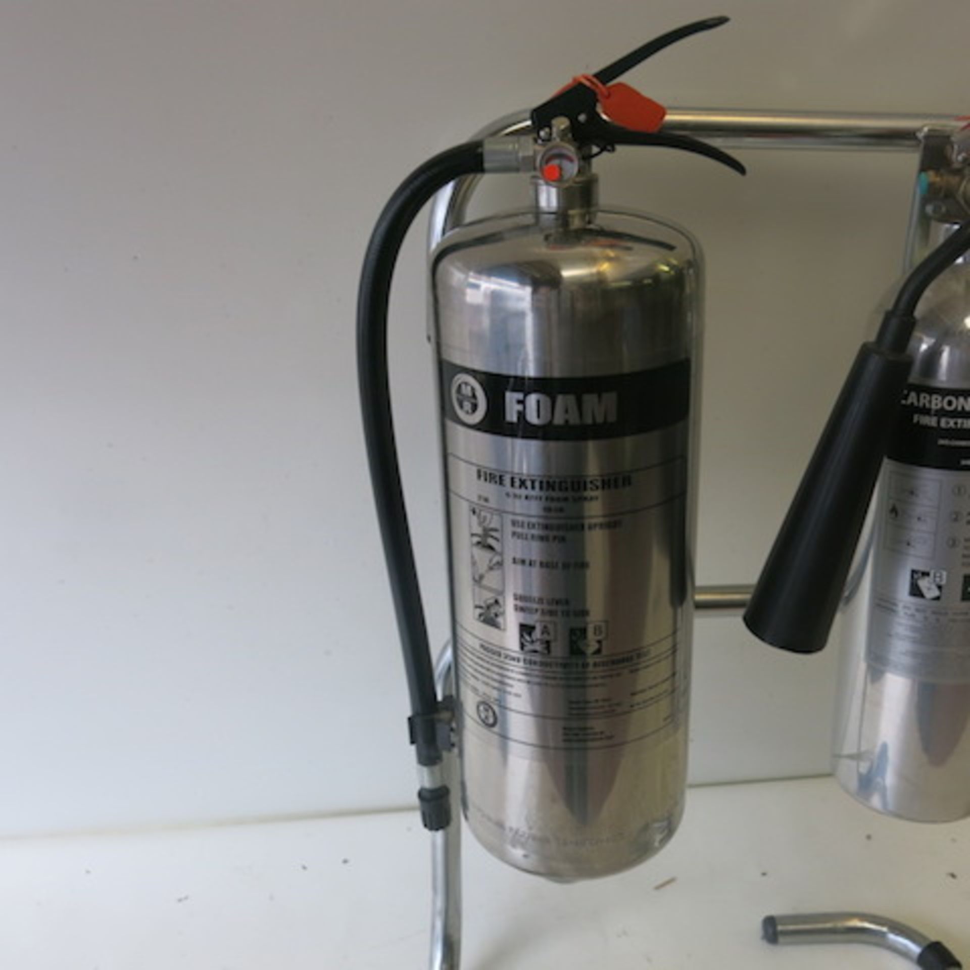 2 x Stainless Steel/Polished Aluminum Fire Extinguishers on Frame, 1 Foam, 1 Carbon Dioxide, - Image 2 of 4