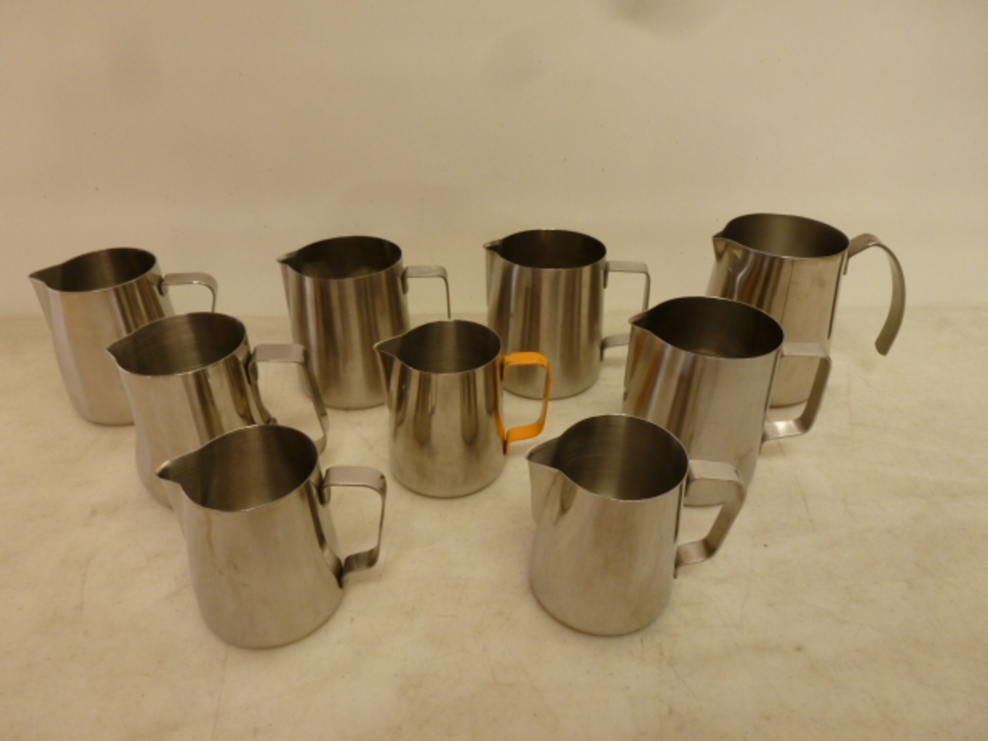 9 x Assorted Sized Stainless Steel Milk Jugs