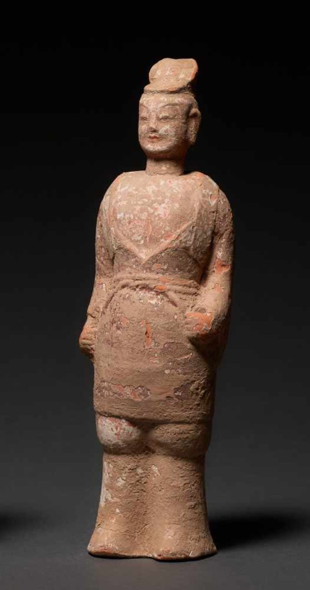 COURTIER Terracotta with painting. China, Wei Dynasty (5th to 6th cent.) A rare smaller figure