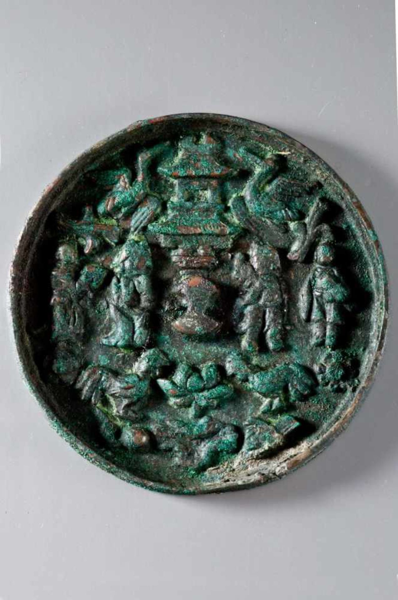 MIRROR WITH PAGODA, BIRDS AND FIGURES Bronze. China, in the style of Yuan-dynasty Circular form,