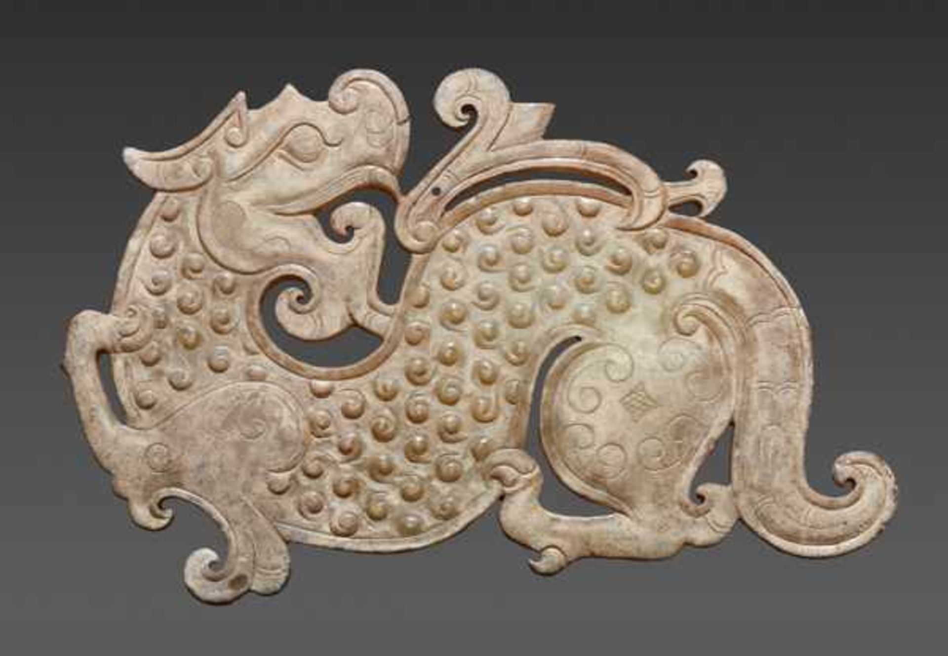 AN EXQUISITE AND RARE TIGER-SHAPED PENDANT IN PALE GREEN JADE WITH FINE INCISED DECORATION Jade, - Image 2 of 6