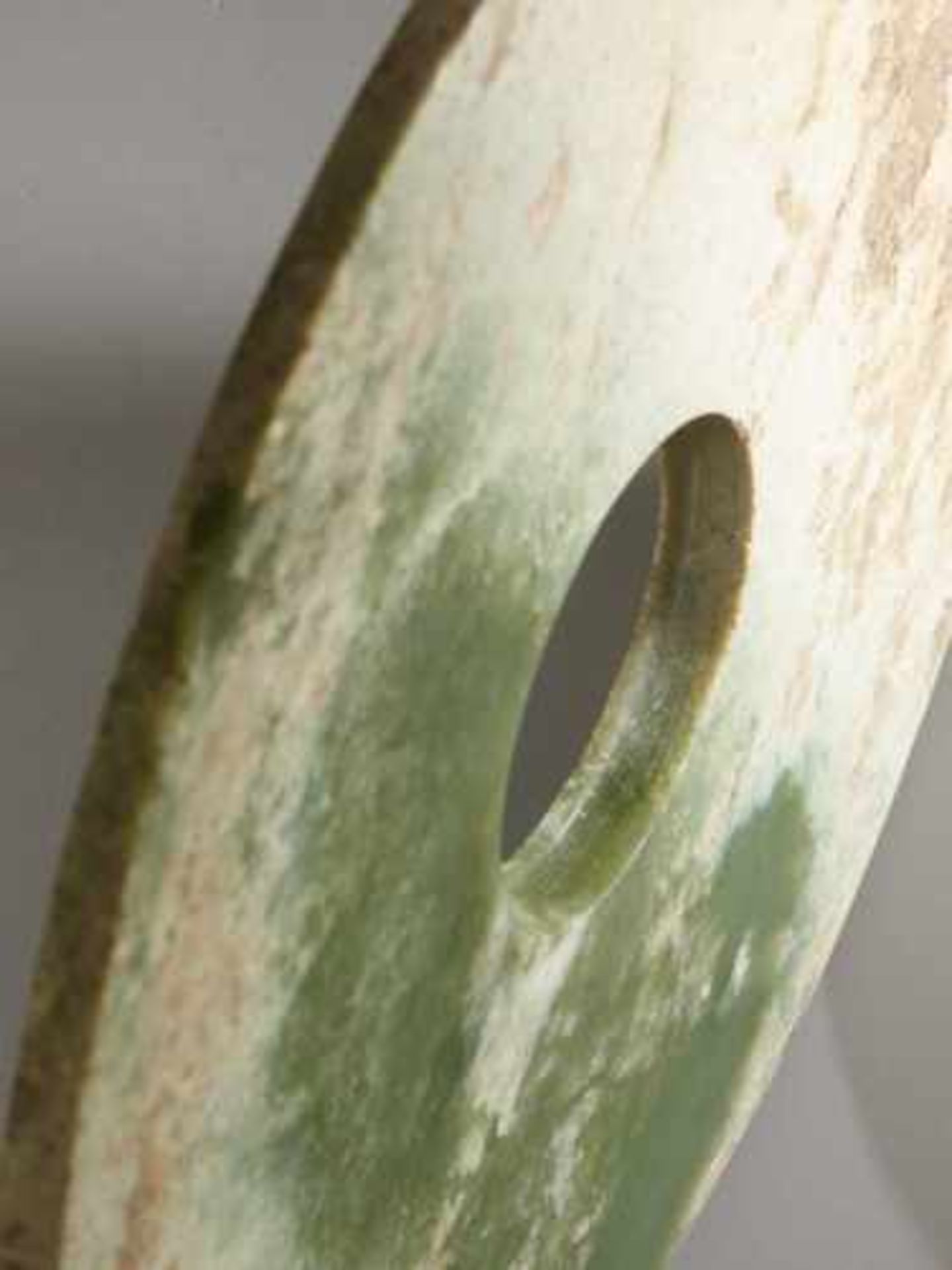 A LARGE SMOOTH BI DISC IN GREEN JADE WITH WHITENED AREAS Jade, China. Early Bronze Age, c. 2200-1600 - Image 3 of 7
