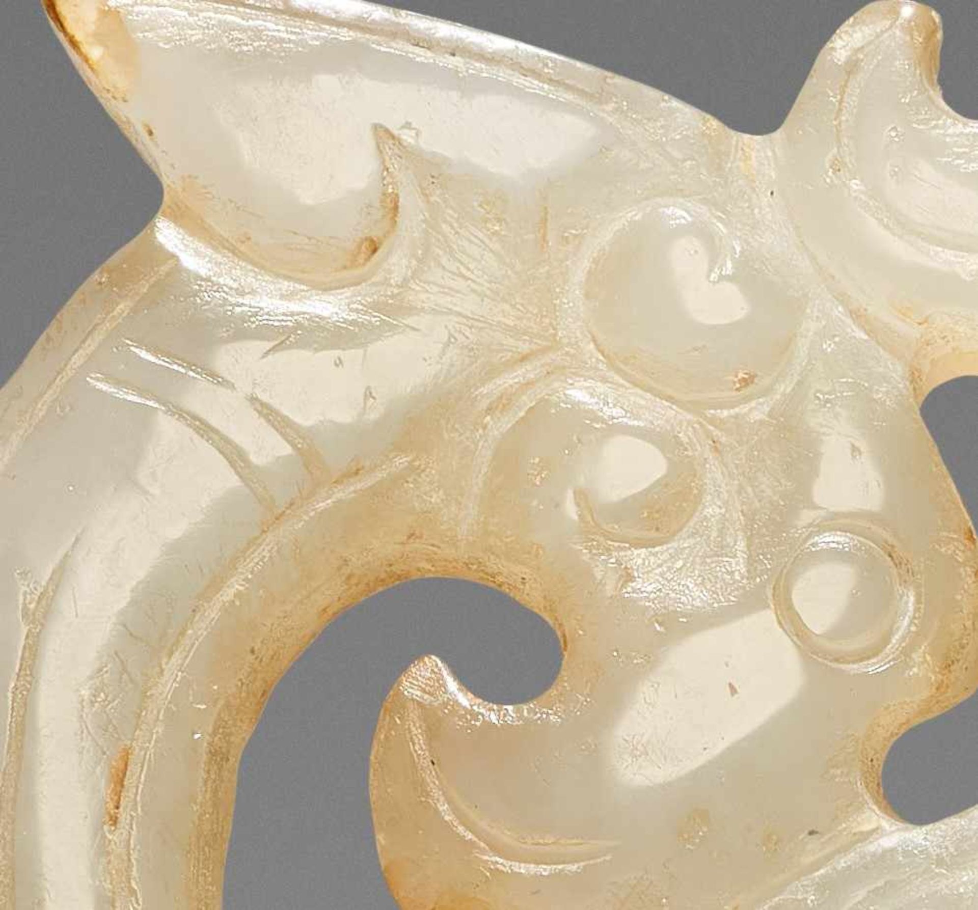 A GRACEFUL ORNAMENT IN OPENWORK WITH DRAGON AND PHOENIX MOTIF Jade, China. Eastern Zhou, Warring - Image 8 of 8