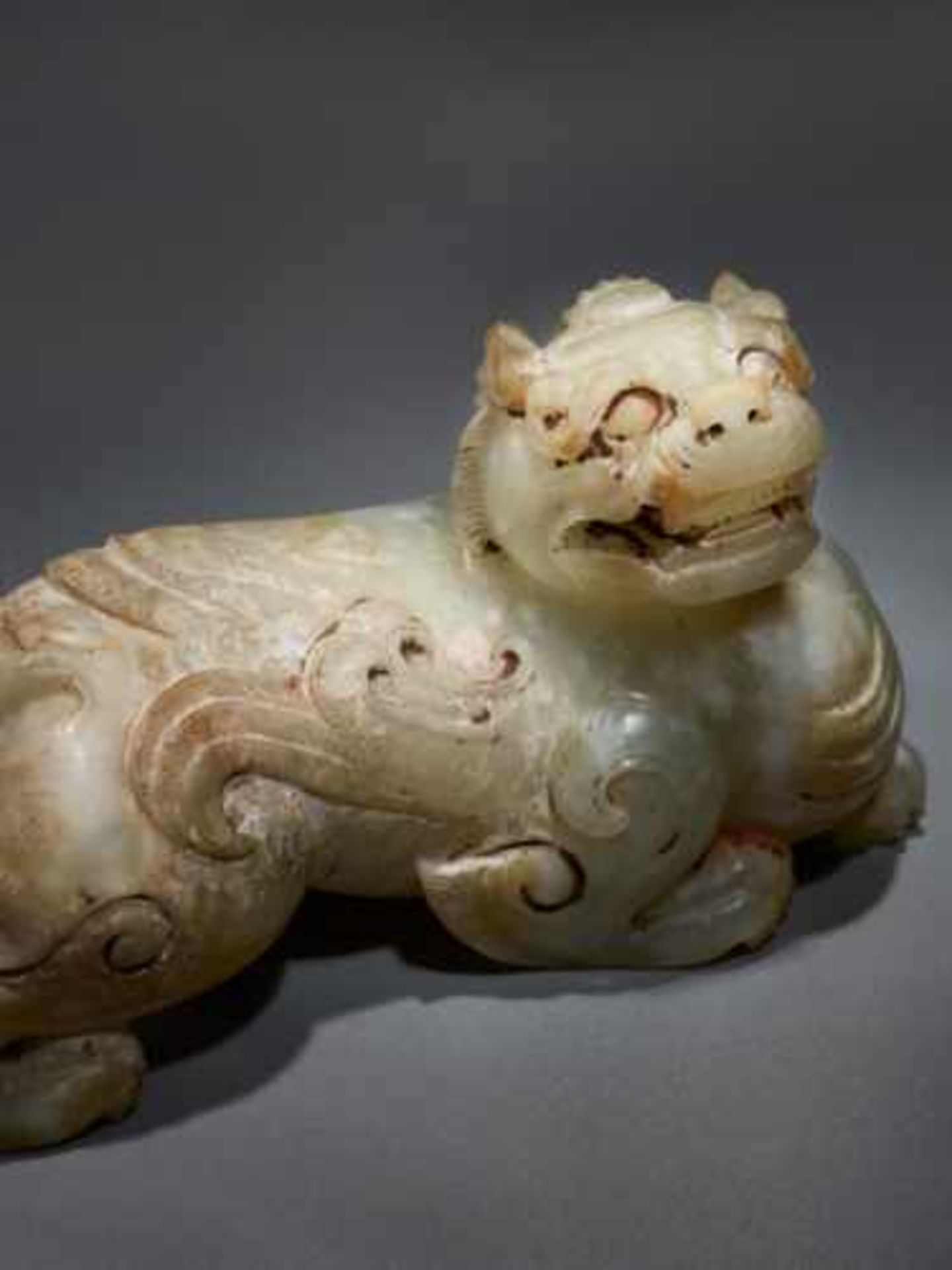 A POWERFUL AND EXQUISITE WINGED MYTHICAL ANIMAL (BIXIE) CARVED IN KHOTAN JADE Jade, China. Western - Image 5 of 7