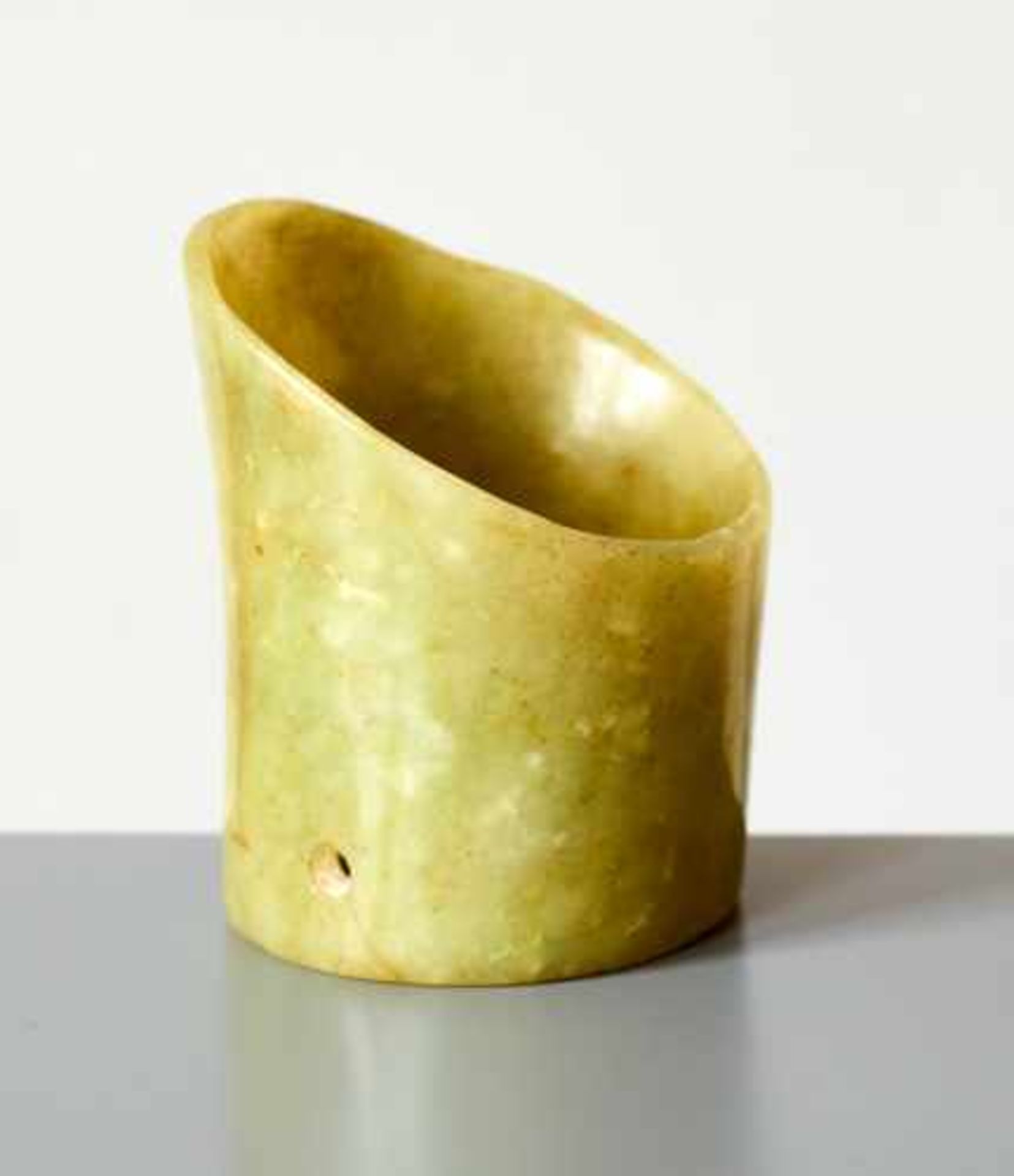 A SMALL HOOF-SHAPED (TI XING) SLANTED TUBE CARVED IN LIGHT GREEN JADE Jade, China. Late Neolithic - Image 3 of 6