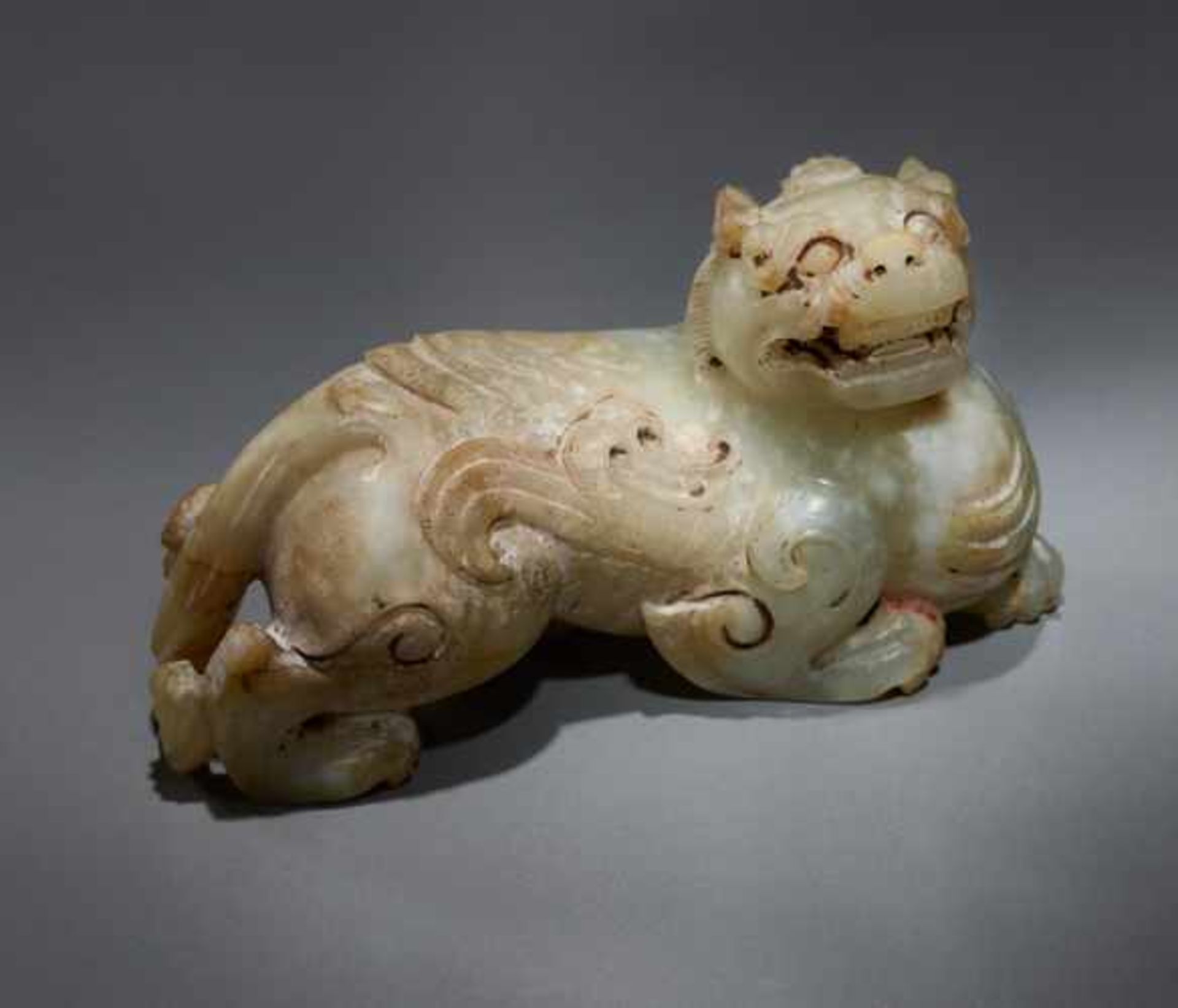 A POWERFUL AND EXQUISITE WINGED MYTHICAL ANIMAL (BIXIE) CARVED IN KHOTAN JADE Jade, China. Western - Image 2 of 7