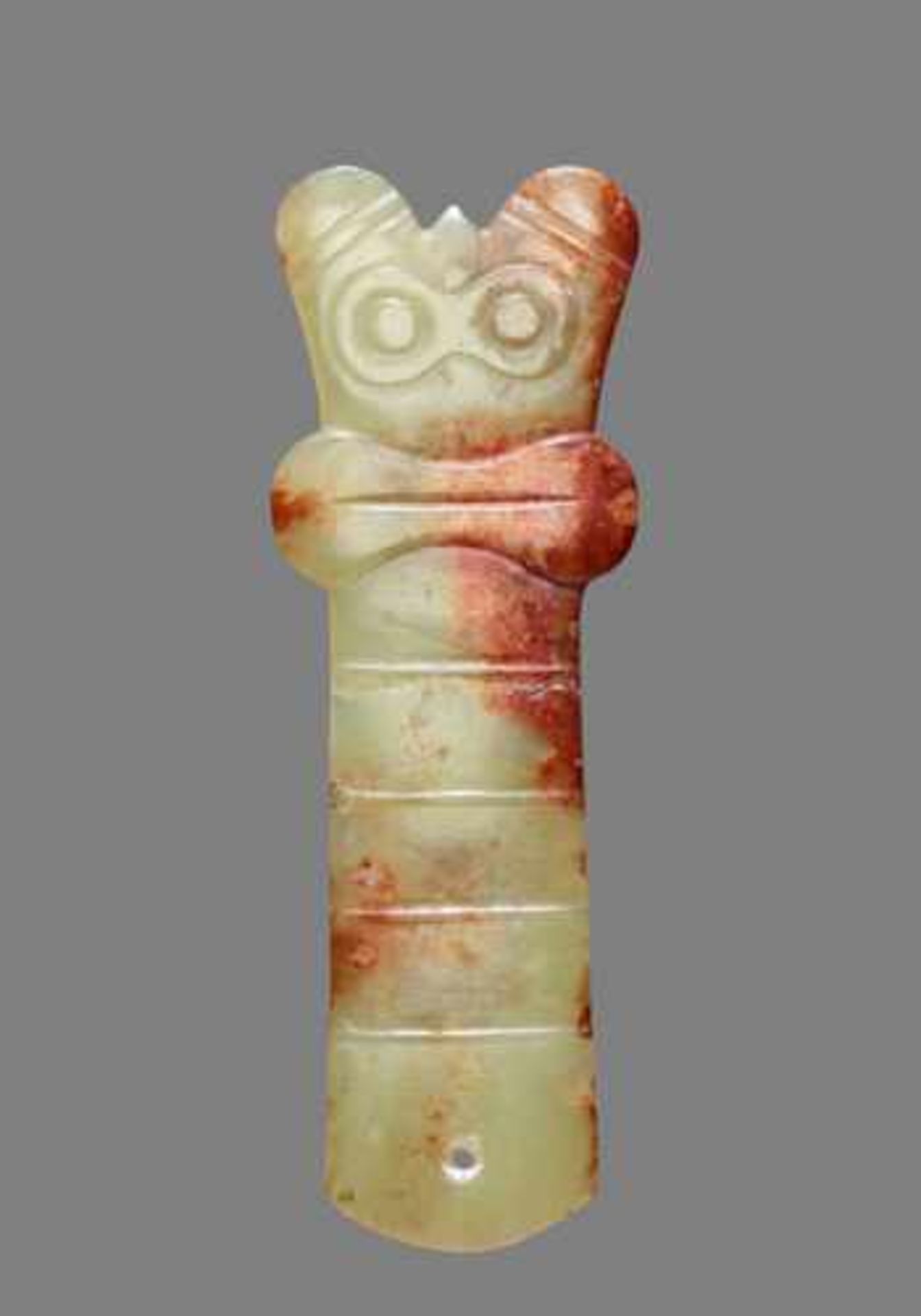 AN INTRIGUING Y-SHAPED JADE WITH MASK MOTIF Jade, China. Late Neolithic period, Hongshan culture,