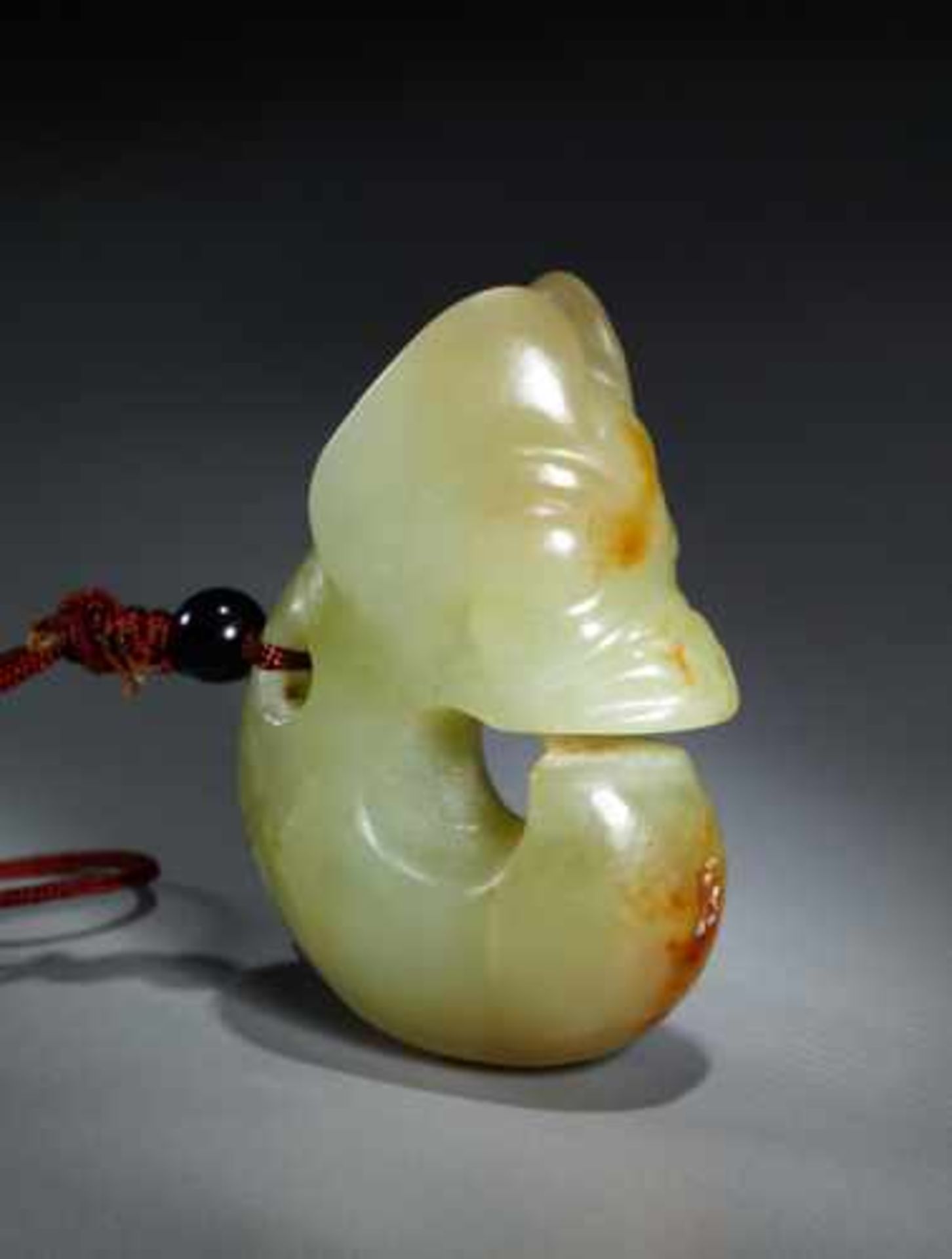 A CHARMING SMALL “PIG-DRAGON” – ZHULONG Jade, China. Late Neolithic period, Hongshan culture, c. - Image 3 of 6