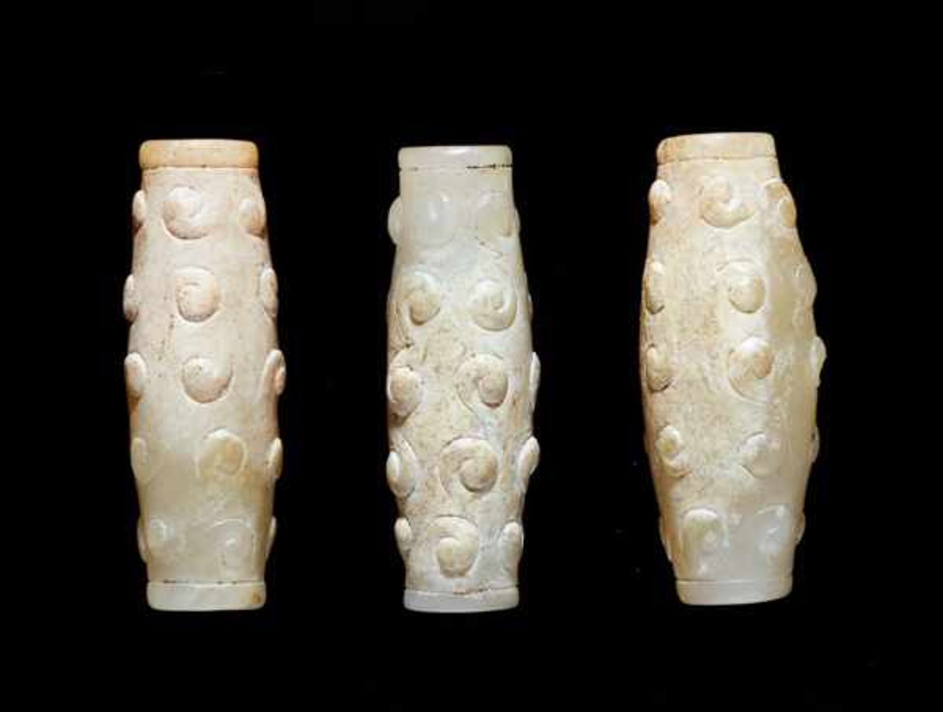 THREE TINY BEADS IN WHITE JADE WITH DELICATELY CARVED SCROLLS IN RELIEF Jade, China. Eastern Zhou, - Image 4 of 8