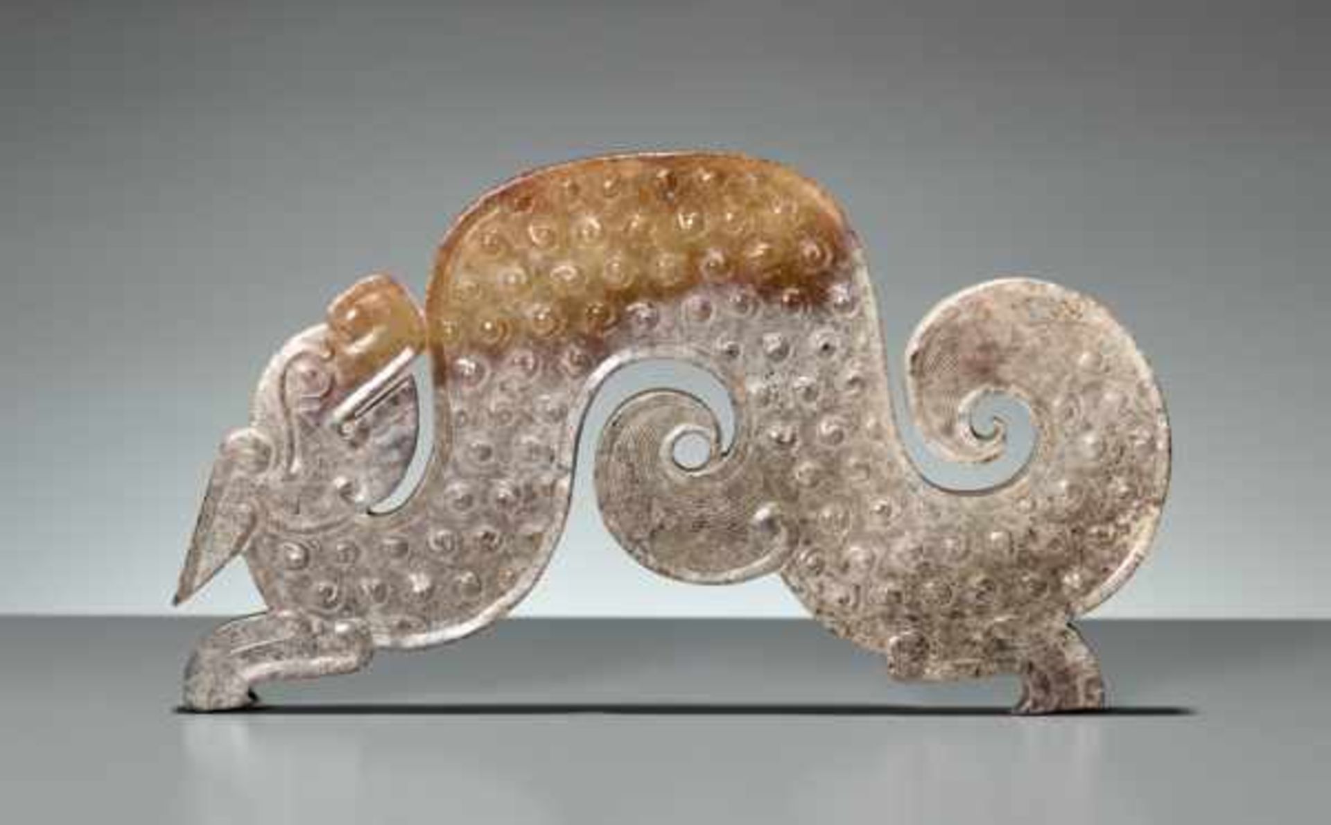 A GRACEFUL S-SHAPED DRAGON WITH FELINE FEATURES AND CURLED APPENDAGES Jade, China. Eastern Zhou, 4th - Image 2 of 8