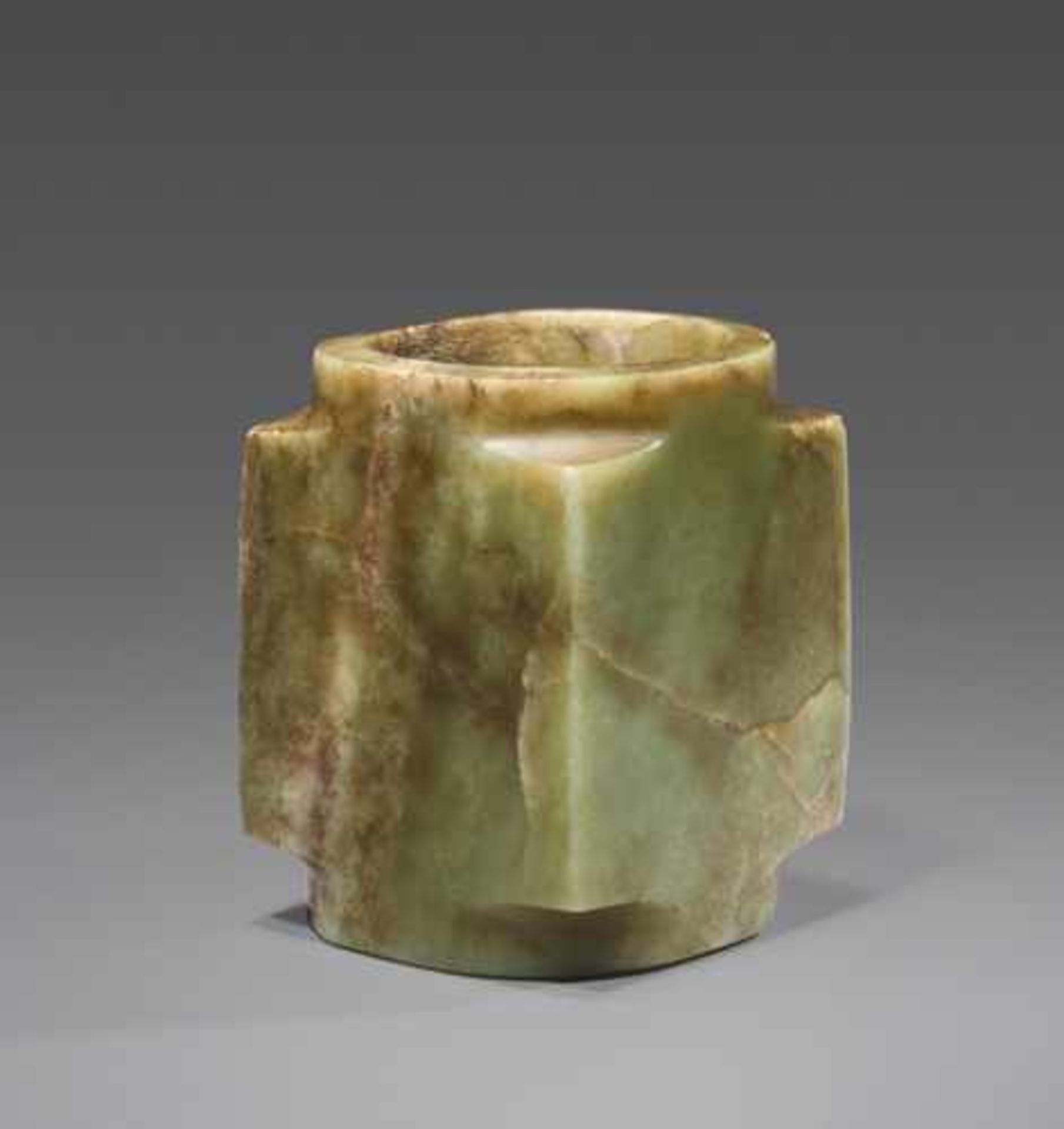 AN ELEGANT, PLAIN CONG IN HIGHLY POLISHED, LIGHT GREEN JADE Jade, China. Early Bronze Age, Qijia