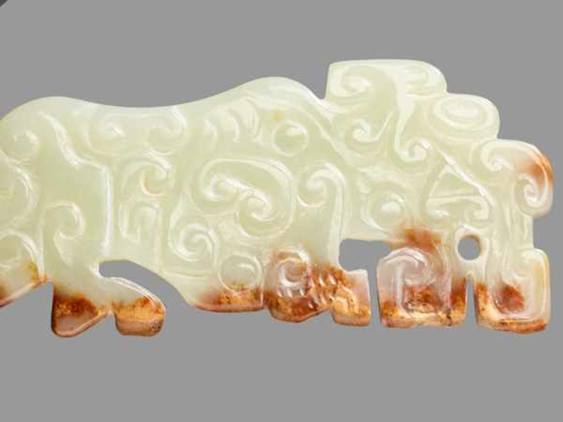 SMALL TIGER-SHAPED ORNAMENT IN TRANSLUCENT GREEN JADE Jade, China. Eastern Zhou, late Spring and - Image 4 of 8