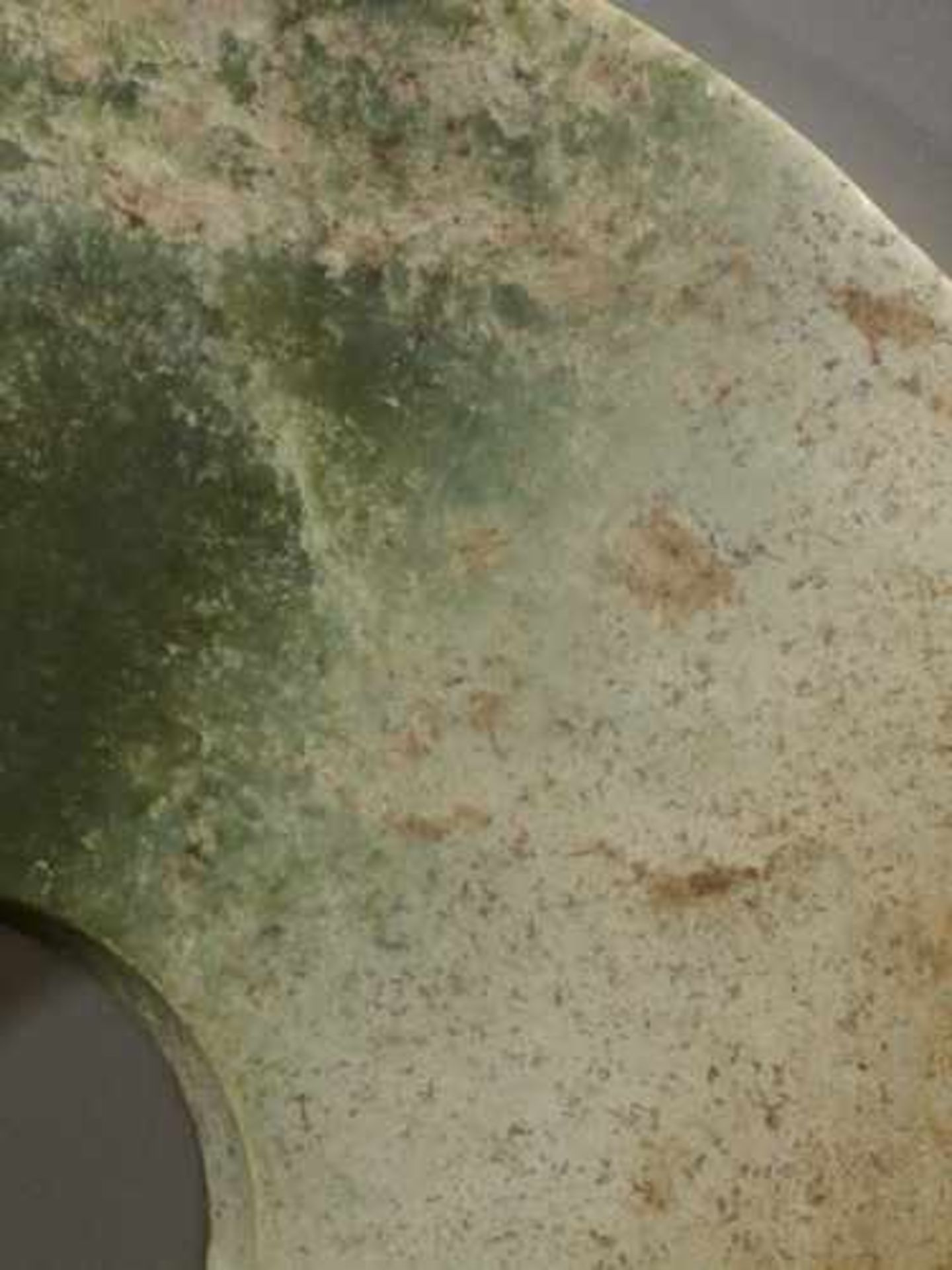 A LARGE SMOOTH BI DISC IN GREEN JADE WITH WHITENED AREAS Jade, China. Early Bronze Age, c. 2200-1600 - Image 5 of 7