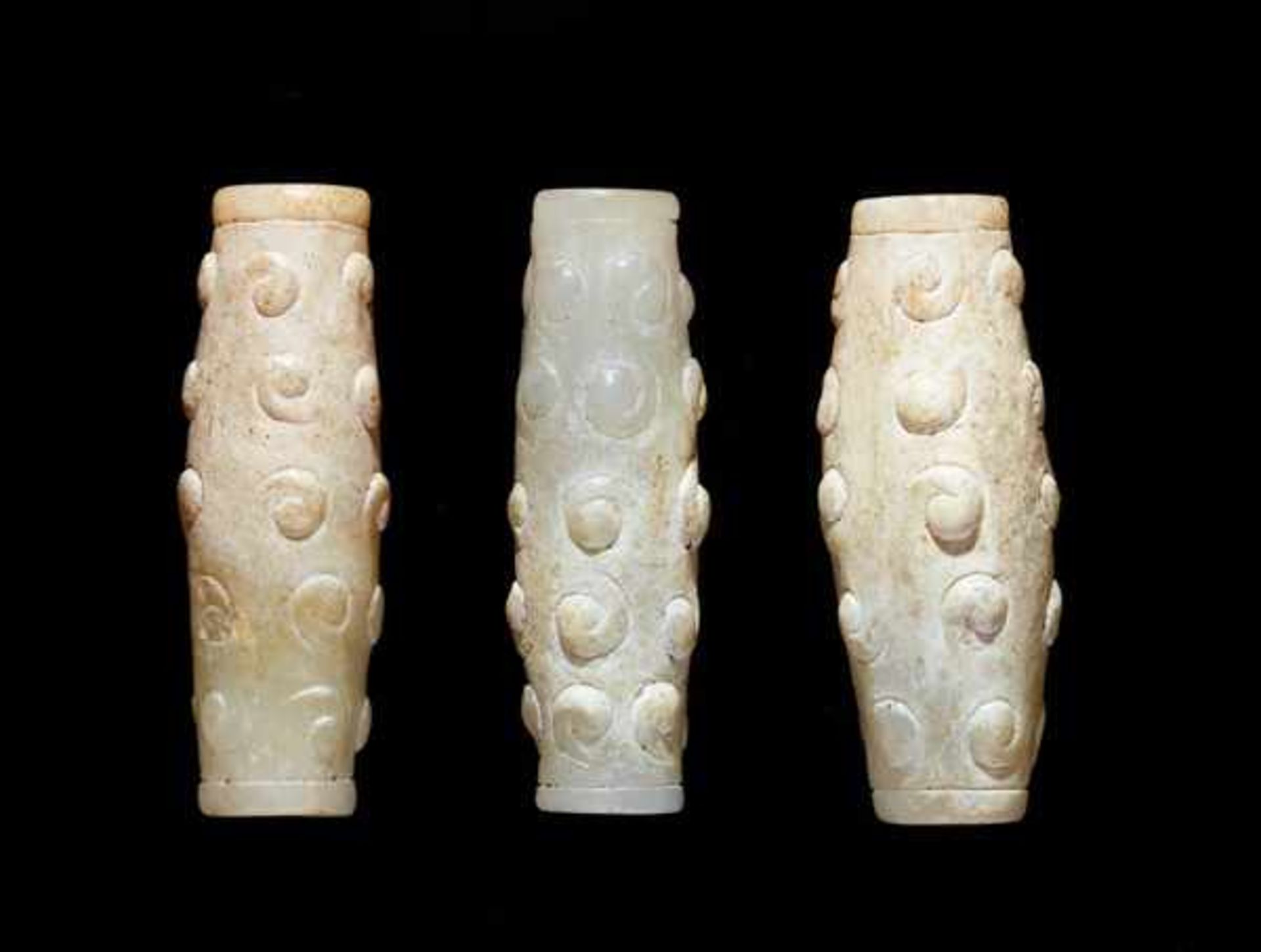 THREE TINY BEADS IN WHITE JADE WITH DELICATELY CARVED SCROLLS IN RELIEF Jade, China. Eastern Zhou, - Image 2 of 8