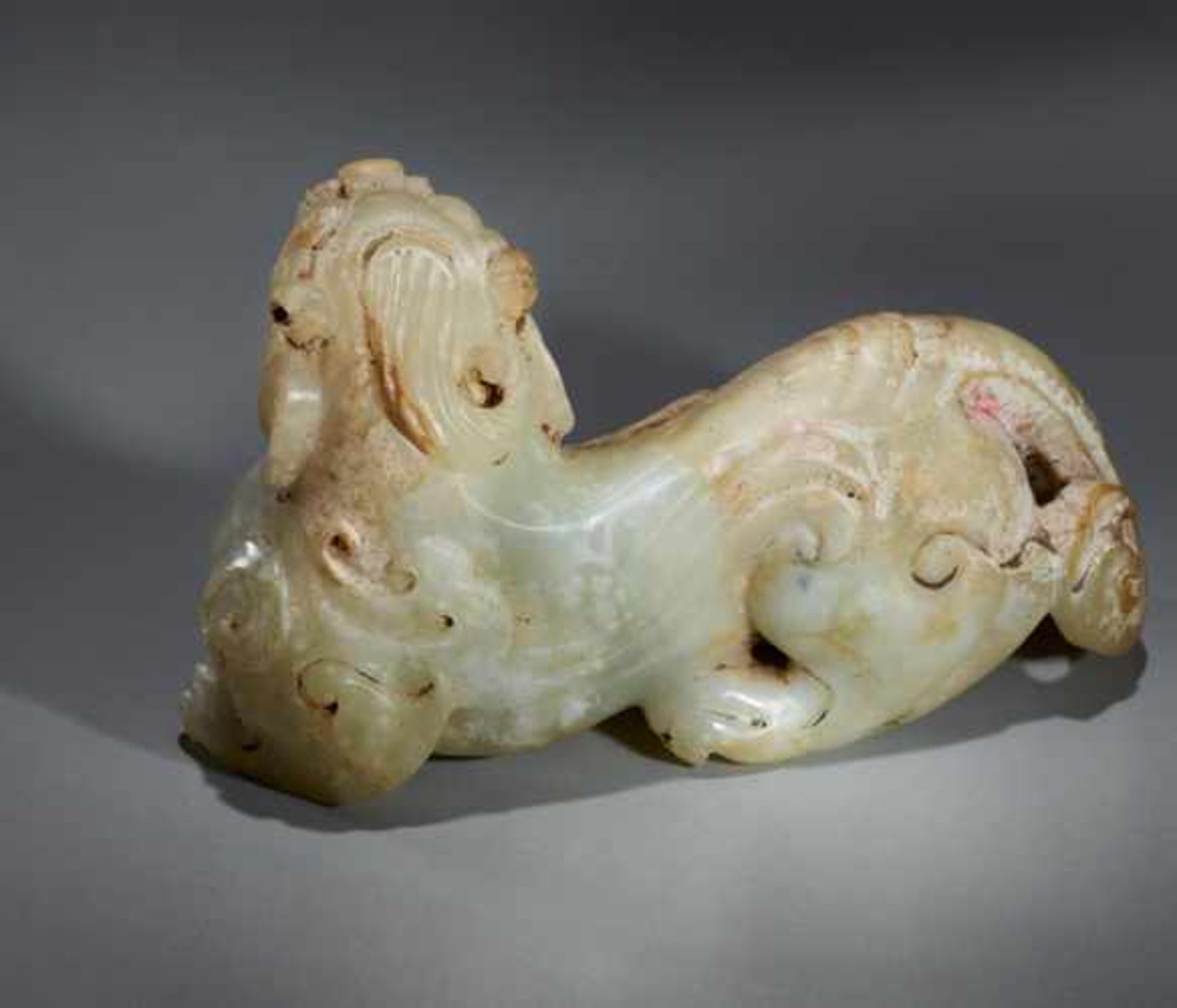 A POWERFUL AND EXQUISITE WINGED MYTHICAL ANIMAL (BIXIE) CARVED IN KHOTAN JADE Jade, China. Western - Image 3 of 7