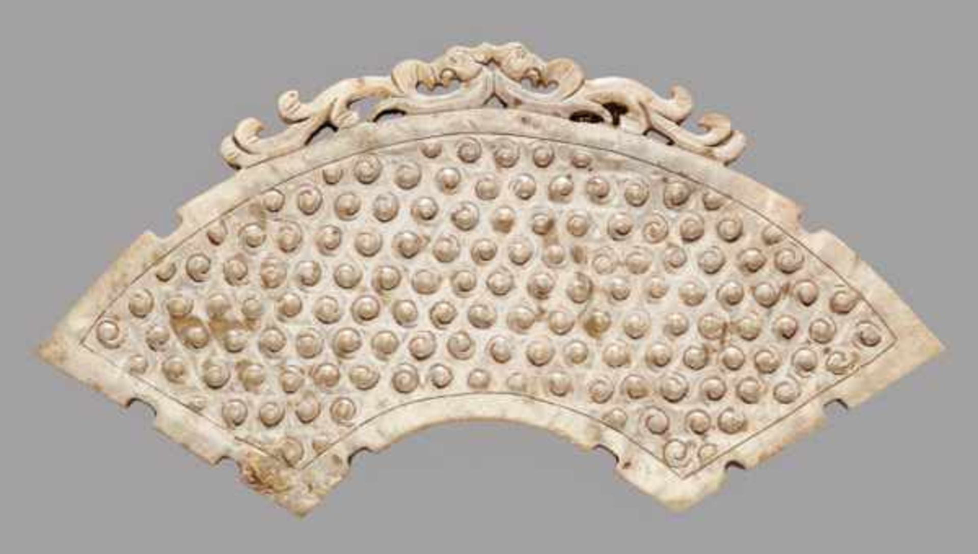 AN OUTSTANDING ORNATE ARCHED ORNAMENT (HUANG) EMBELLISHED WITH PHOENIXES AND RAISED SPIRALS Jade,