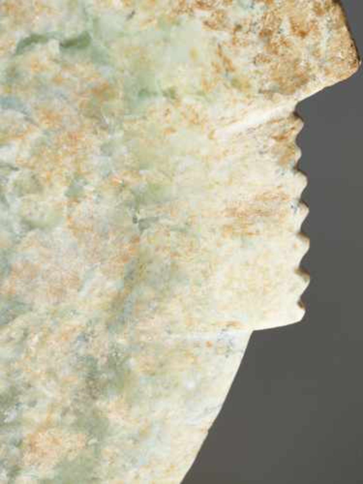 AN IMPRESSIVE EARLY BRONZE AGE NOTCHED DISC IN GREEN JADE Jade, China. Early Bronze Age, ca 2200- - Image 3 of 6