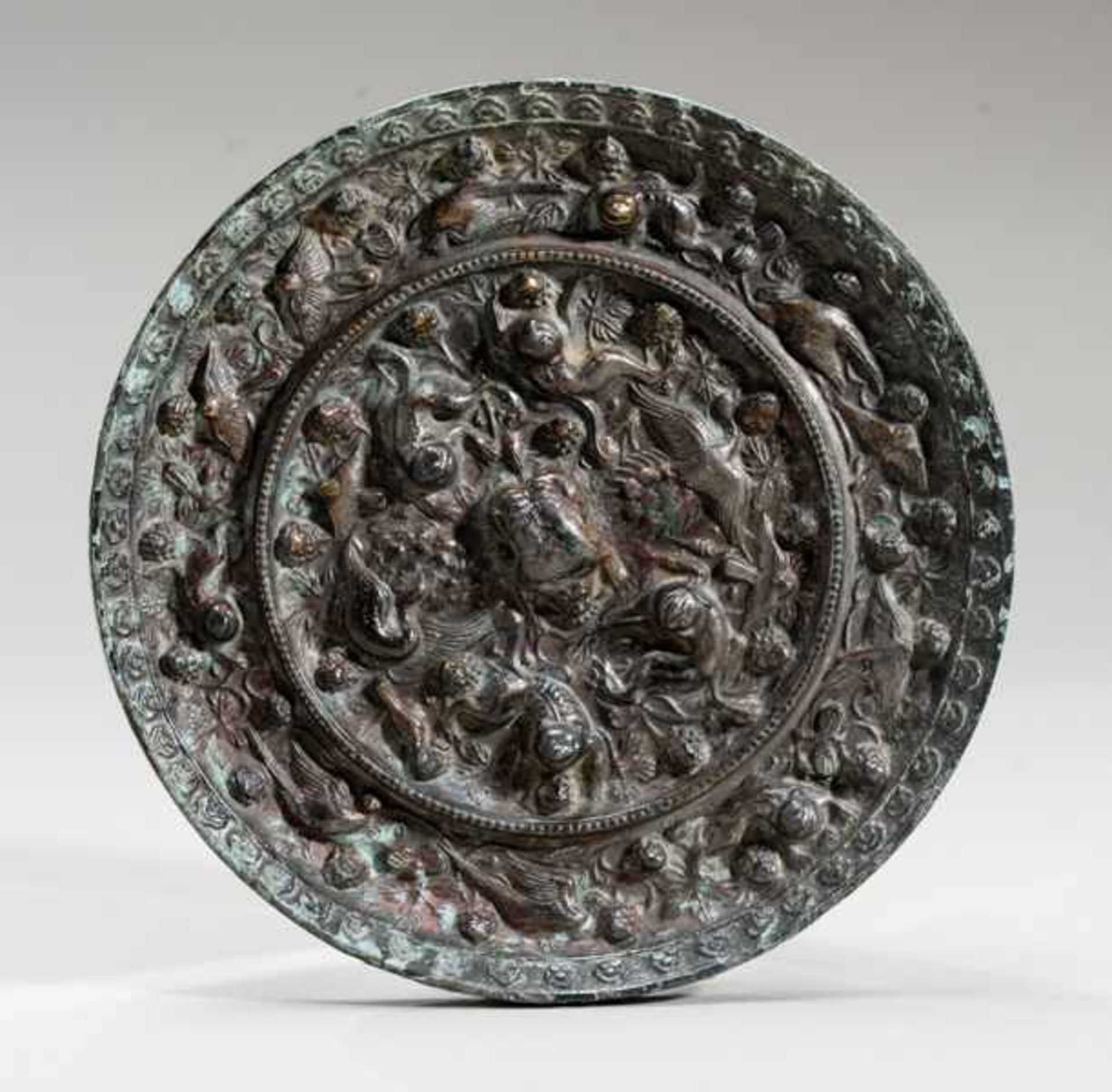 MIRROR RICHLY ORNAMENTED WITH ANIMALS Bronze. China, Tang dynasty (618 - 907)瑞獸銅鏡Decorated in a very