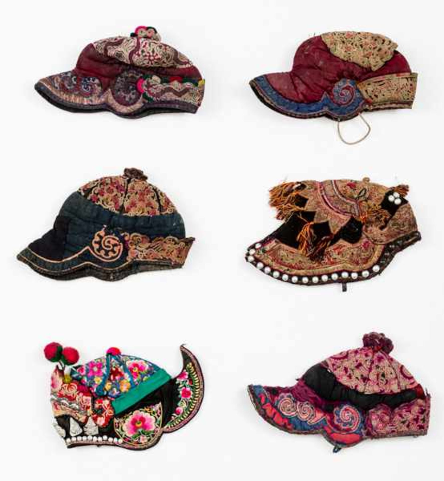 6 CHILDREN’S HATS Rough fabric and silk. China, ca. 19006個童帽Some of these come from the Miao and