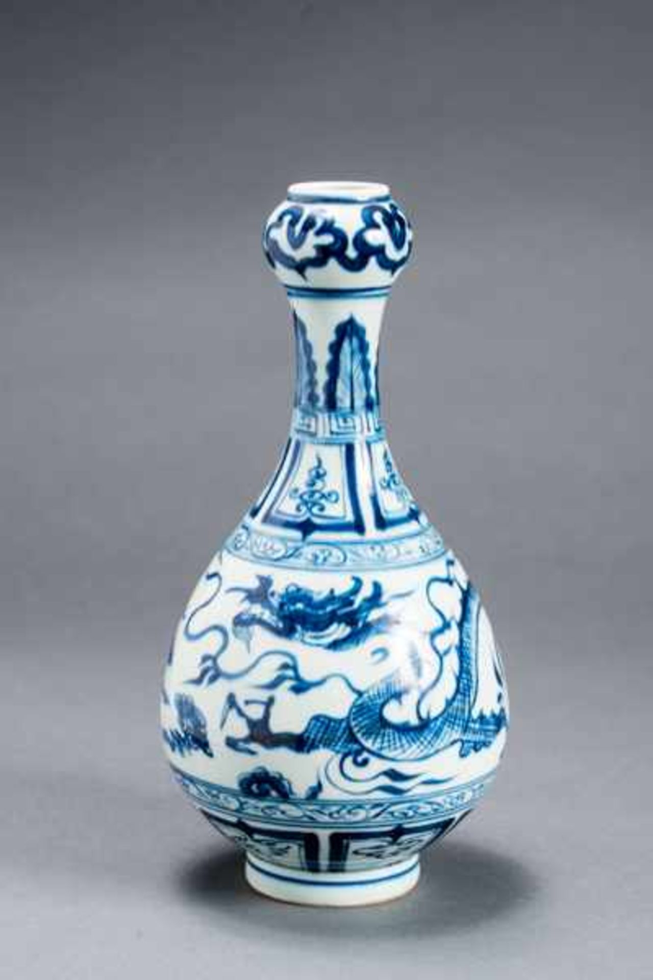 VASE WITH FIERY DRAGON Porcelain with blue underglaze. China, 祥龍蒜頭瓶Very furiously painted, three-