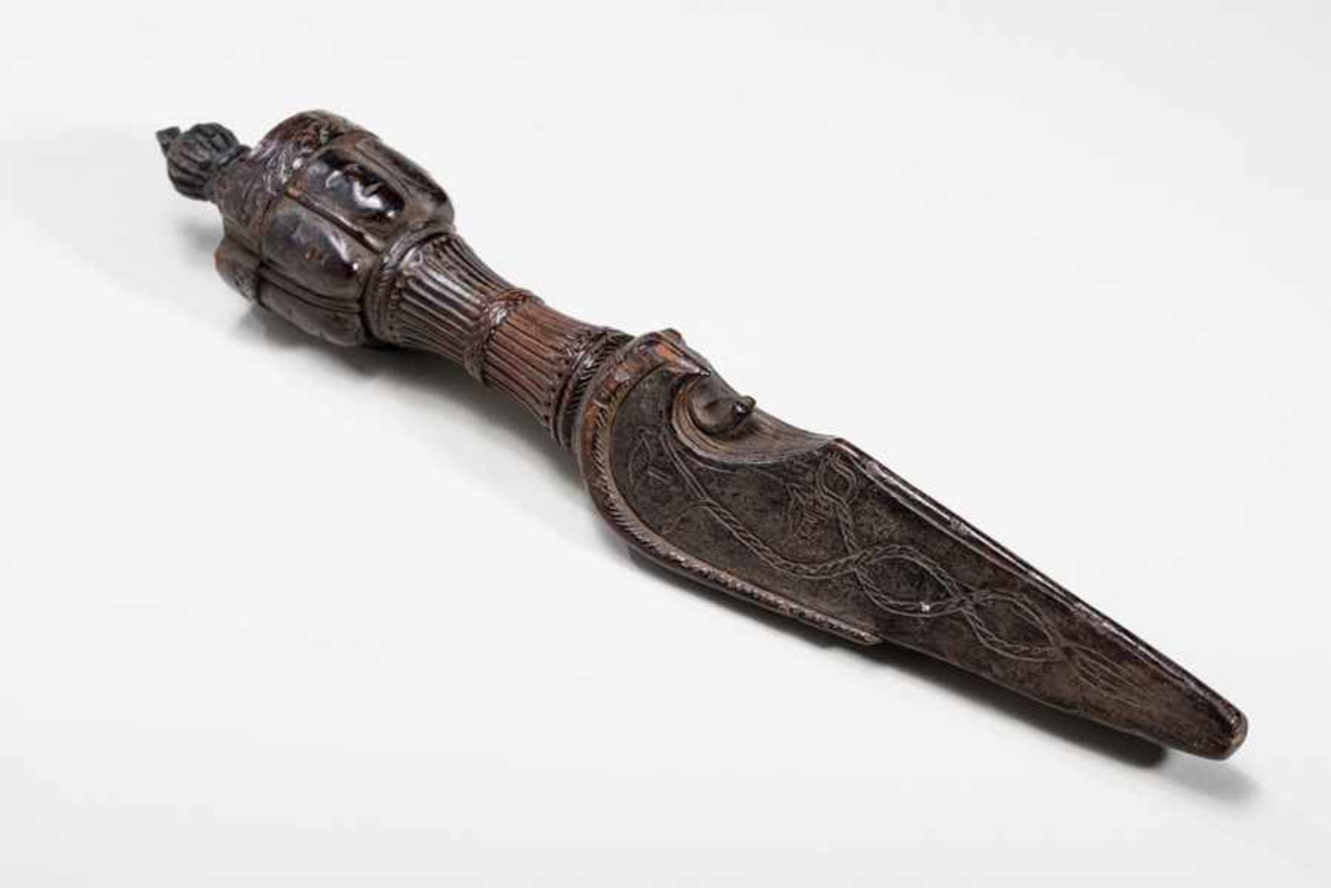 GHOST DAGGER WITH HEADS OF PROTECTIVE DIVINITIES Stained wood. Tibet, 18th to 19th cent.神人首匕首Large