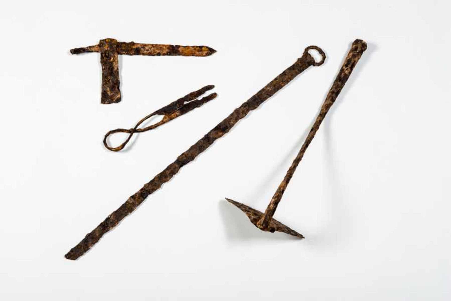 RARE COLLECTION OF IRON TOOLS Iron. China, ca. Han dynasty, 206 BCE - 220 CE,to Northern Wei dynasty