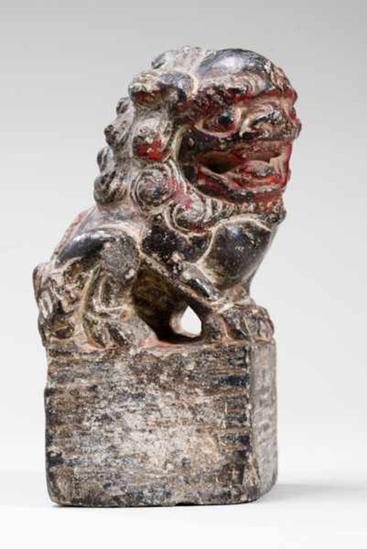 SITTING LION-DOG Stone. China, Ming dynasty (1368-1644)獅毛狗坐像A small sculpture full of character